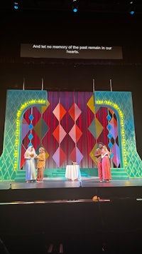 a stage with a group of people on stage